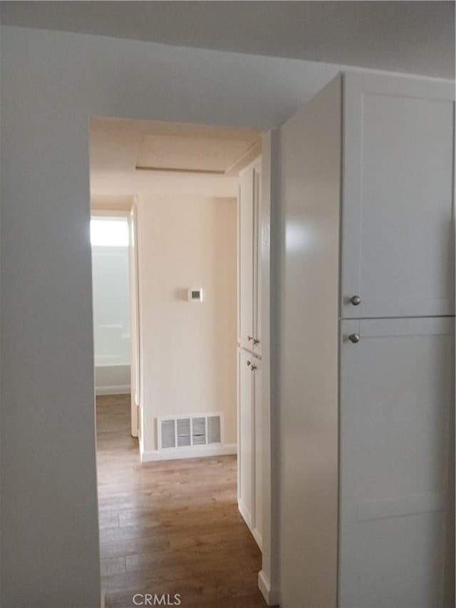 4493 Estada, Oceanside, CA 92057 - hallway with wood finished floors and baseboards