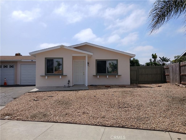 4493 Estada, Oceanside, CA 92057 - view of front of property featuring driveway, stucco siding, and an attached garage