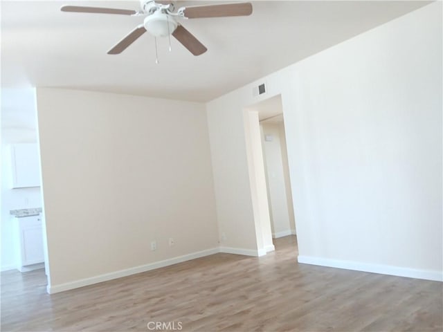 4493 Estada, Oceanside, CA 92057 - empty room with light wood-type flooring and ceiling fan