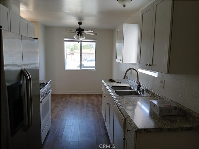4493 Estada, Oceanside, CA 92057 - kitchen with stainless steel refrigerator with ice dispenser, white stove, ceiling fan, dishwasher, and dark wood-style flooring