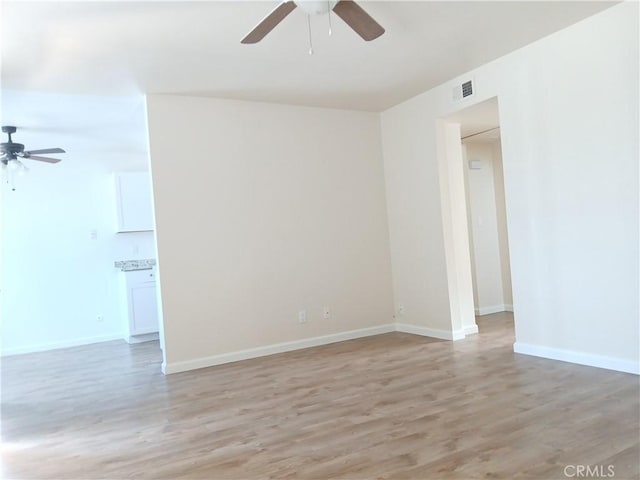 4493 Estada, Oceanside, CA 92057 - unfurnished room with a ceiling fan and light wood-style flooring