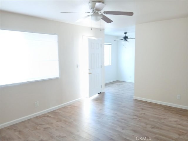 4493 Estada, Oceanside, CA 92057 - unfurnished room with a ceiling fan and wood finished floors