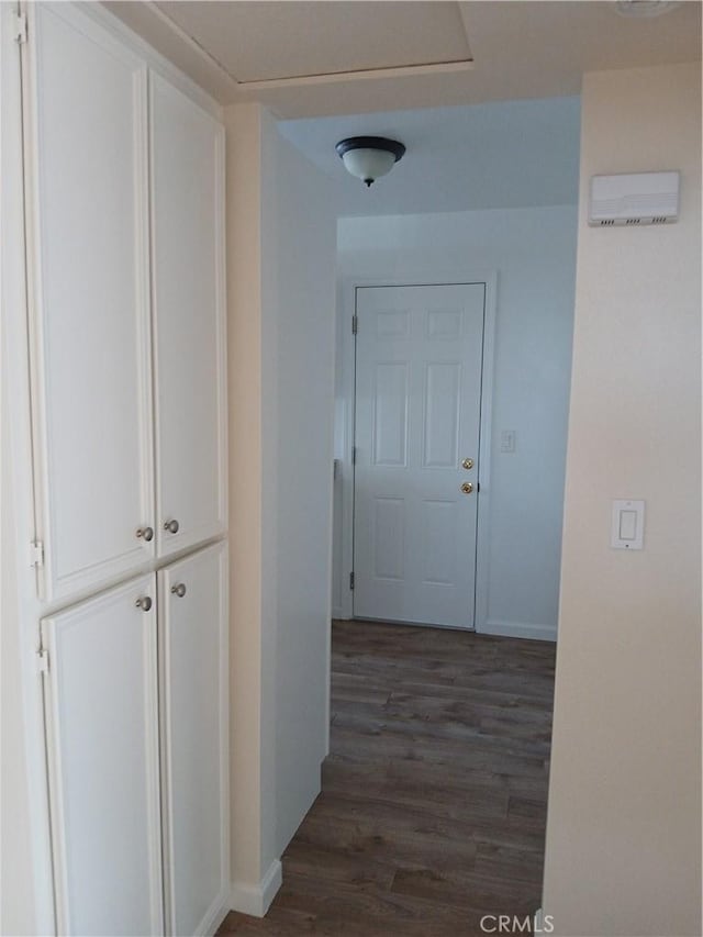 4493 Estada, Oceanside, CA 92057 - corridor featuring dark wood-style floors and baseboards