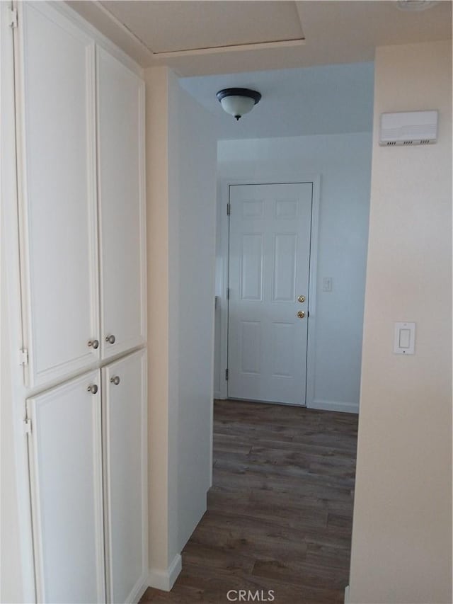 4493 Estada, Oceanside, CA 92057 - hallway featuring dark wood-type flooring and baseboards