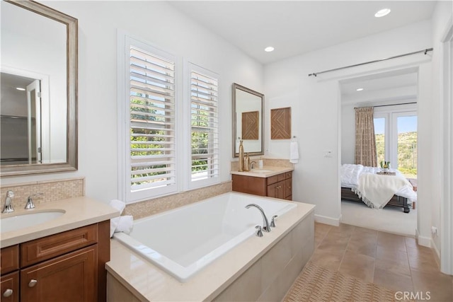 1278 Inspiration, West Covina, CA 91791 - bathroom with two vanities, a bath, backsplash, recessed lighting, and tile patterned flooring