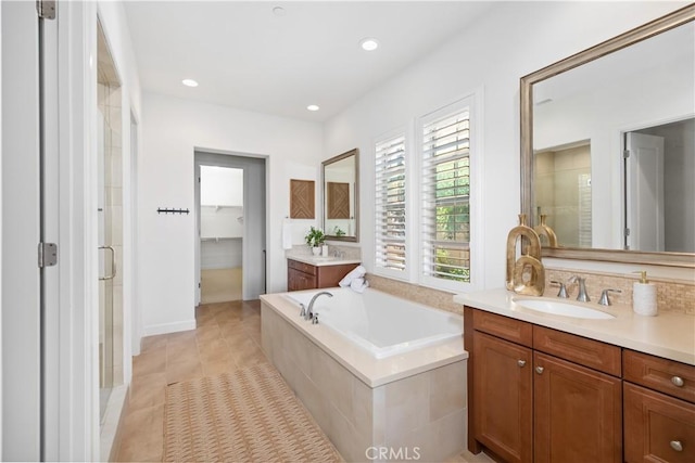 1278 Inspiration, West Covina, CA 91791 - bathroom with vanity, a garden tub, a stall shower, tile patterned flooring, and recessed lighting