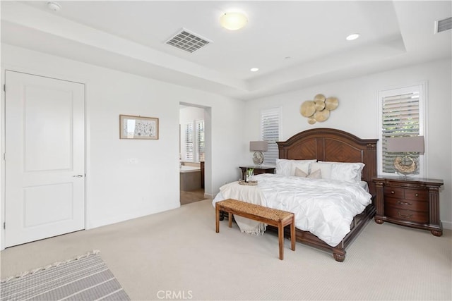 1278 Inspiration, West Covina, CA 91791 - bedroom featuring a tray ceiling, light colored carpet, recessed lighting, and connected bathroom
