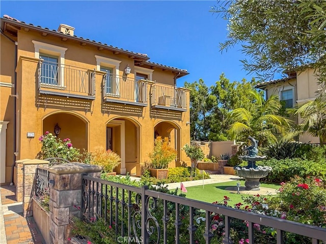 1278 Inspiration, West Covina, CA 91791 - back of house featuring a balcony and stucco siding
