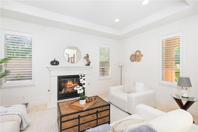 1278 Inspiration, West Covina, CA 91791 - living room with a glass covered fireplace, a tray ceiling, and recessed lighting