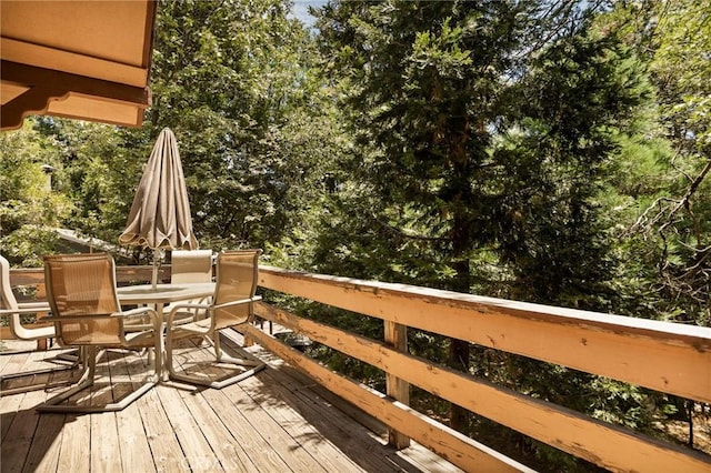 1230 Bear Springs Rd, Rimforest, CA 92378 - wooden deck with outdoor dining area