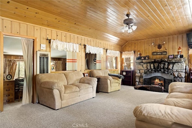 1230 Bear Springs Rd, Rimforest, CA 92378 - carpeted living area with wooden walls, wood ceiling, lofted ceiling, a ceiling fan, and a stone fireplace