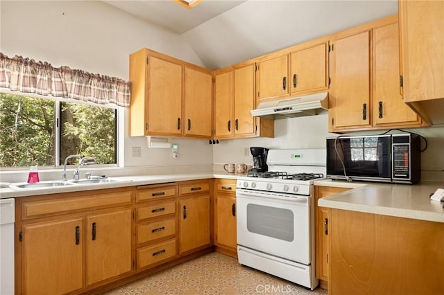 1230 Bear Springs Rd, Rimforest, CA 92378 - kitchen with under cabinet range hood, white appliances, light countertops, and lofted ceiling