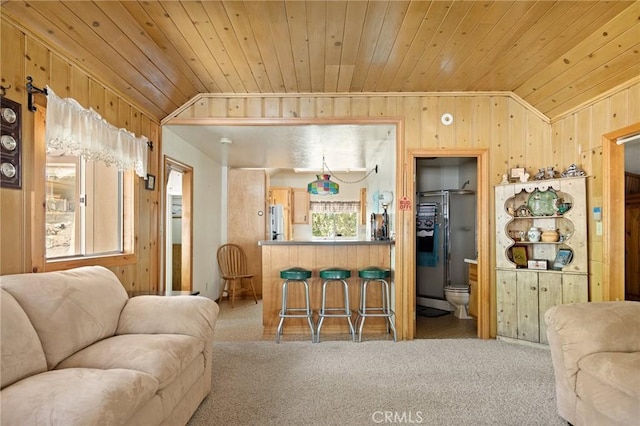 1230 Bear Springs Rd, Rimforest, CA 92378 - living area featuring carpet, wooden walls, wooden ceiling, crown molding, and vaulted ceiling