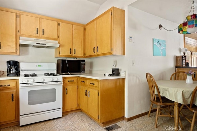 1230 Bear Springs Rd, Rimforest, CA 92378 - kitchen with white range with gas cooktop, under cabinet range hood, vaulted ceiling, and light countertops
