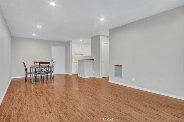 3603 W Hidden Ln Unit 210, Rolling Hills Estates, CA 90274 - dining room featuring light wood finished floors, recessed lighting, and heating unit