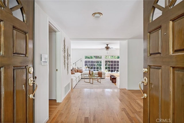 4241 Kingfisher Rd, Calabasas, CA 91302 - foyer entrance with ceiling fan and light wood finished floors