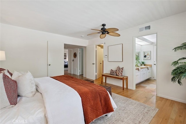 4241 Kingfisher Rd, Calabasas, CA 91302 - bedroom featuring light wood-type flooring, connected bathroom, and ceiling fan