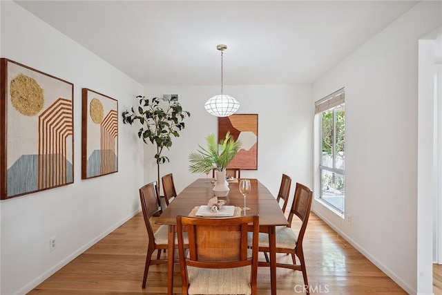 4241 Kingfisher Rd, Calabasas, CA 91302 - dining area with light wood-style floors