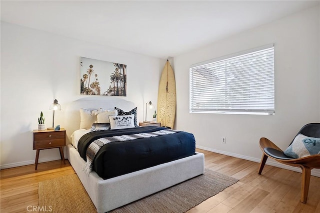 4241 Kingfisher Rd, Calabasas, CA 91302 - bedroom with wood finished floors and baseboards