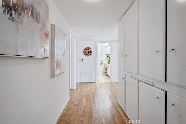 4241 Kingfisher Rd, Calabasas, CA 91302 - hall featuring light wood-style floors and baseboards