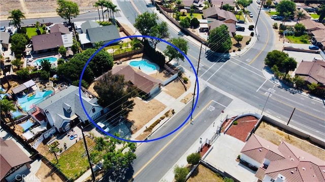 7707 Bolton Ave, Riverside, CA 92503 - aerial perspective of suburban area featuring a pool area