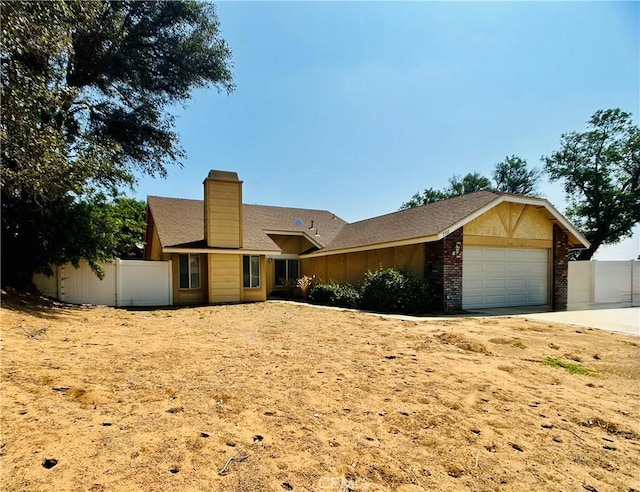 7707 Bolton Ave, Riverside, CA 92503 - single story home featuring an attached garage, a chimney, driveway, and a shingled roof