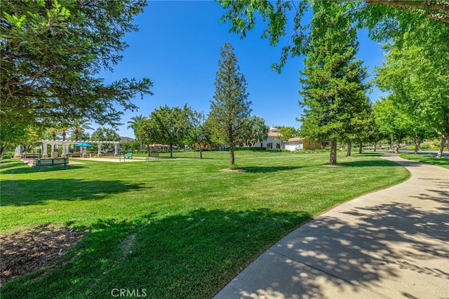 23785 Western Cedar Ct, Valencia, CA 91354 - view of community featuring a yard and a pergola