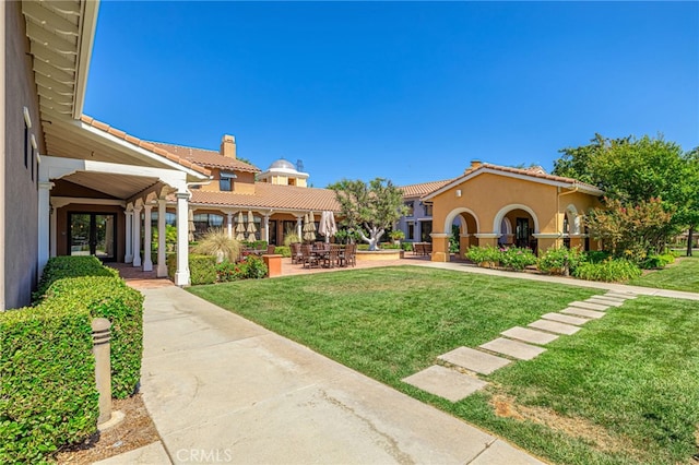 23785 Western Cedar Ct, Valencia, CA 91354 - view of grassy yard featuring a patio area