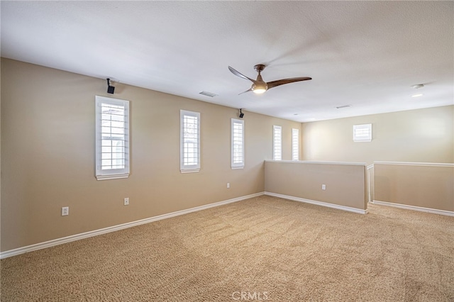 23785 Western Cedar Ct, Valencia, CA 91354 - empty room with ceiling fan and light carpet
