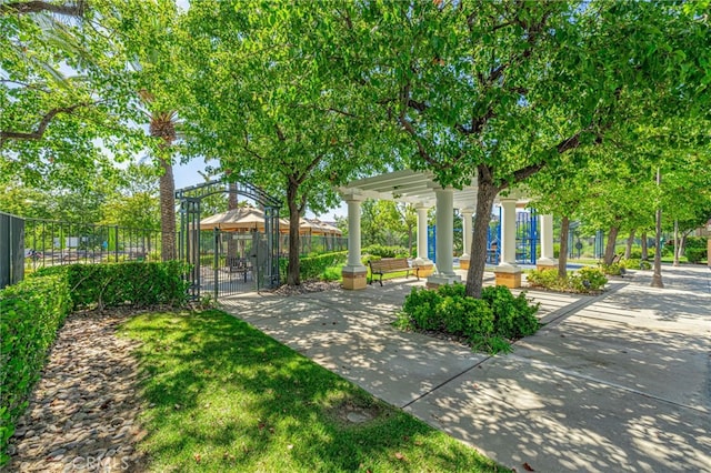23785 Western Cedar Ct, Valencia, CA 91354 - view of yard featuring a gate and a pergola