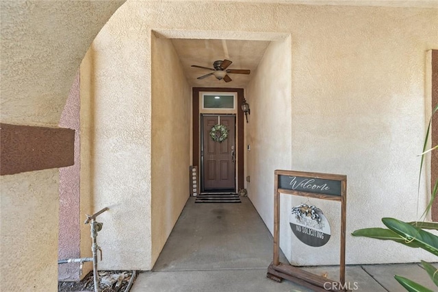 34722 Fairport Way, Yucaipa, CA 92399 - doorway to property featuring stucco siding