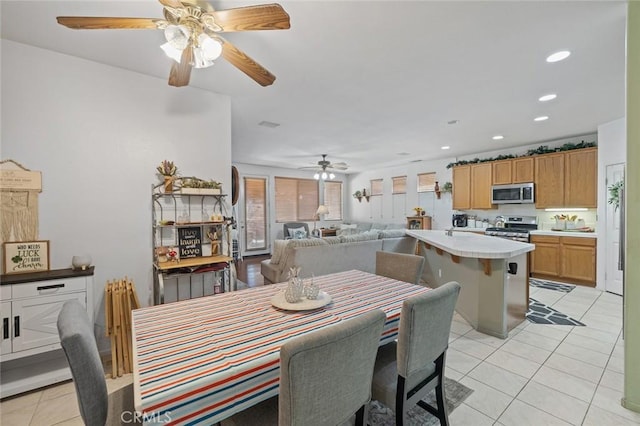 34722 Fairport Way, Yucaipa, CA 92399 - dining space with a ceiling fan, light tile patterned floors, and recessed lighting
