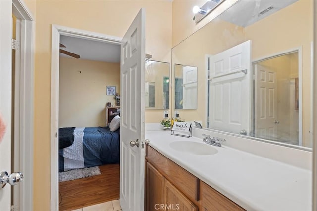 34722 Fairport Way, Yucaipa, CA 92399 - bathroom featuring vanity, connected bathroom, and tile patterned flooring