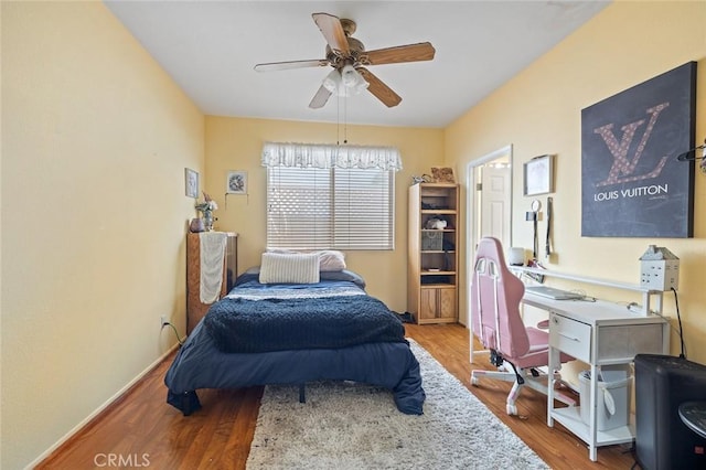 34722 Fairport Way, Yucaipa, CA 92399 - bedroom with wood finished floors, an office area, and ceiling fan