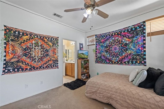 34722 Fairport Way, Yucaipa, CA 92399 - bedroom featuring light colored carpet, ensuite bathroom, a ceiling fan, and multiple windows