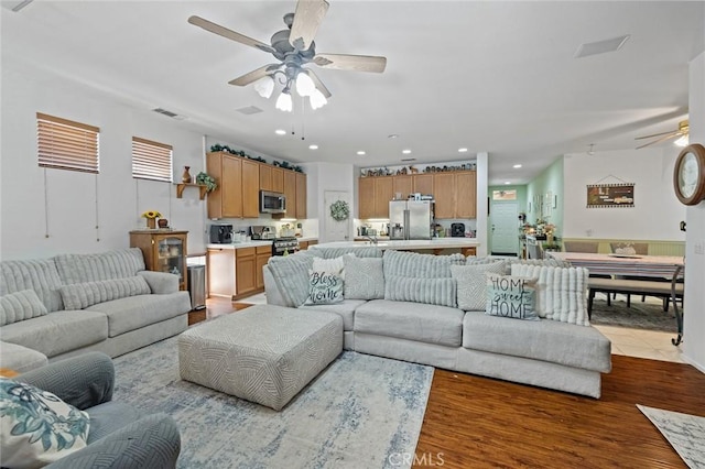 34722 Fairport Way, Yucaipa, CA 92399 - living room featuring a ceiling fan, recessed lighting, and dark wood-type flooring