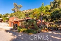 1097 Katherine Rd, Simi Valley, CA 93063 - view of front of property with a chimney