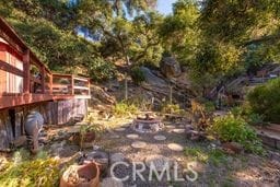 1097 Katherine Rd, Simi Valley, CA 93063 - view of yard with a wooden deck and a fire pit