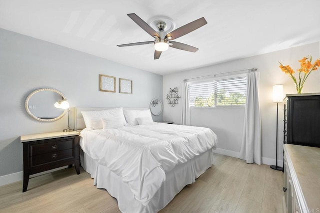 2352 Altisma Way Unit 13, Carlsbad, CA 92009 - bedroom featuring light wood-style flooring and ceiling fan