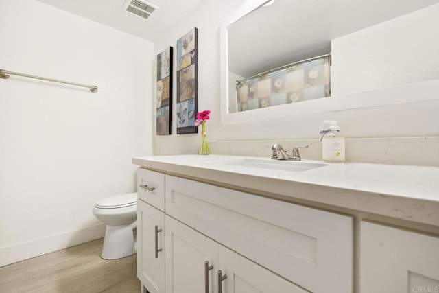 2352 Altisma Way Unit 13, Carlsbad, CA 92009 - bathroom featuring vanity and wood finished floors