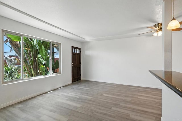4074 48th St Unit 3, San Diego, CA 92105 - entryway featuring wood finished floors and a ceiling fan
