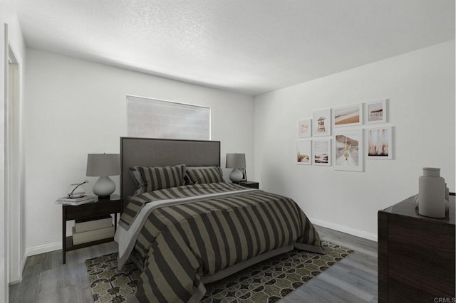 4074 48th St Unit 3, San Diego, CA 92105 - bedroom with wood finished floors and a textured ceiling