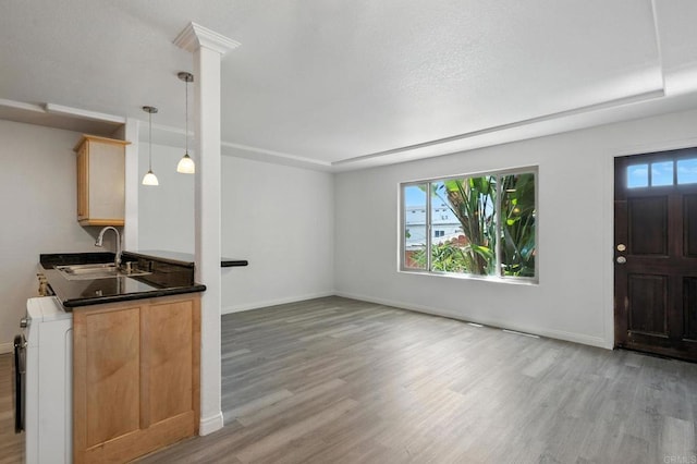 4074 48th St Unit 3, San Diego, CA 92105 - interior space with washer / clothes dryer, light wood finished floors, and dark countertops