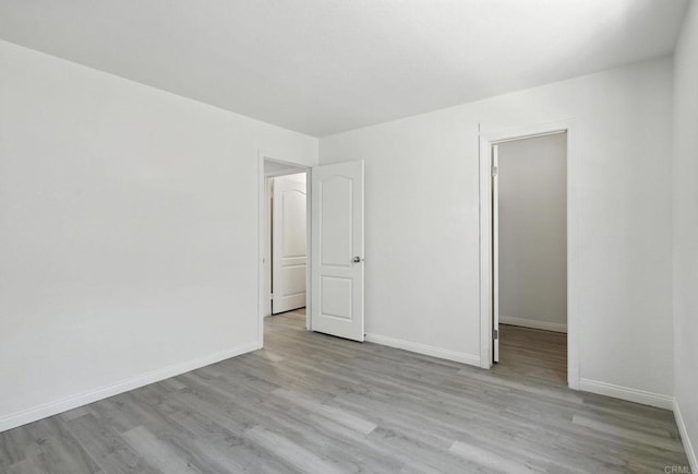 4074 48th St Unit 3, San Diego, CA 92105 - empty room with light wood-style flooring