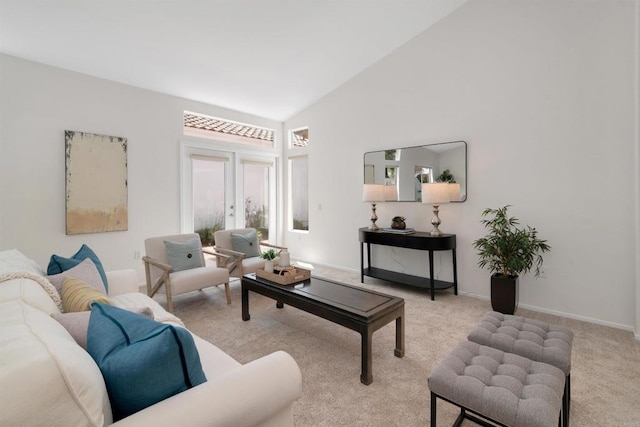 4981 Lerkas Way, Oceanside, CA 92056 - carpeted living room with lofted ceiling and baseboards