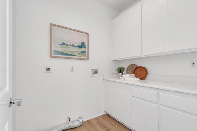 4981 Lerkas Way, Oceanside, CA 92056 - washroom featuring washer hookup, cabinet space, electric dryer hookup, light wood-style floors, and hookup for a gas dryer