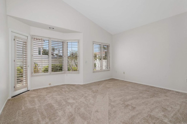 4981 Lerkas Way, Oceanside, CA 92056 - empty room featuring carpet and high vaulted ceiling