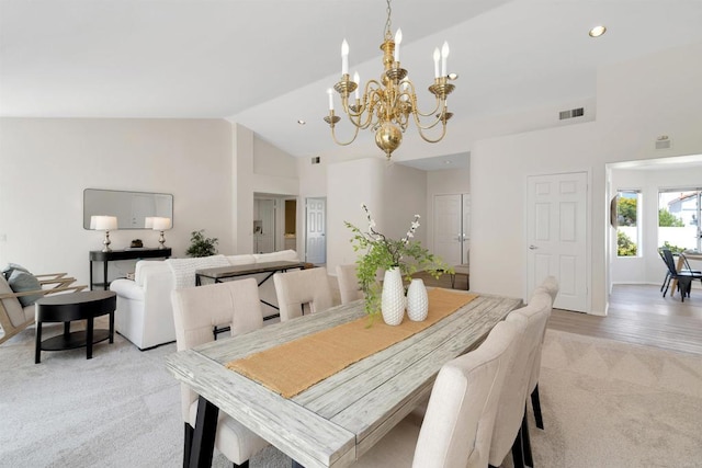 4981 Lerkas Way, Oceanside, CA 92056 - dining space featuring a chandelier, light colored carpet, recessed lighting, and high vaulted ceiling