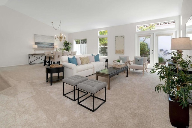 4981 Lerkas Way, Oceanside, CA 92056 - living room featuring lofted ceiling, light carpet, and a chandelier