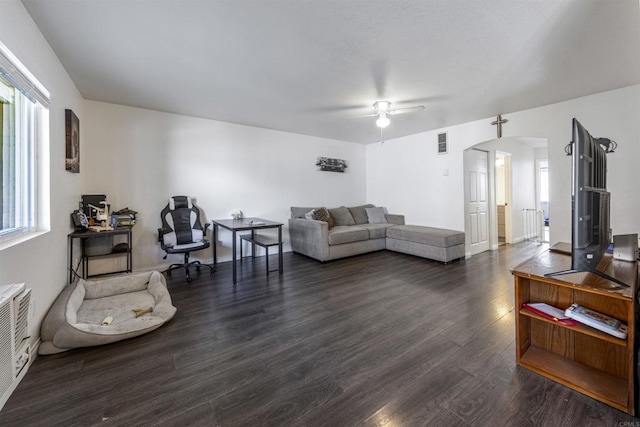 2041 E Grand Ave Unit 19, Escondido, CA 92027 - living room with arched walkways, dark wood finished floors, and ceiling fan